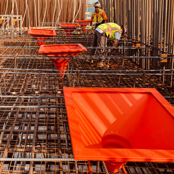 SlikFunnels installed on a rebar cage.